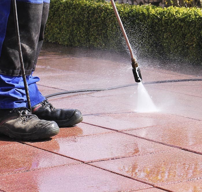 high pressure nozzle cleaning gun on tiles 