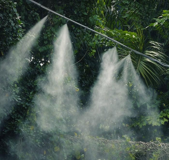 pipe mist spray system emitting water vapour into the air
